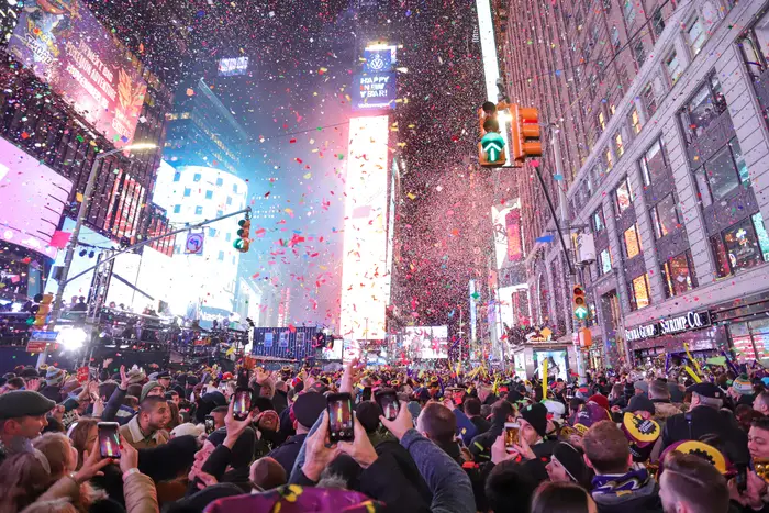 Fireworks and shredded paper during New Year celebrations at Times Square